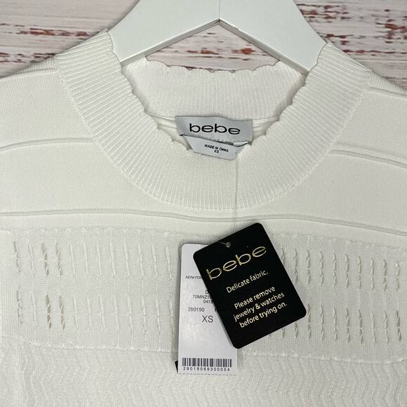 NWT Bebe White Bodycon Scalloped Neckline Mesh Ruffled Diagonal Bottom Dress XS - Picture 8 of 9